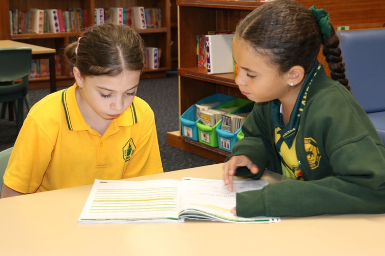 Student leader mentoring year 5 student.