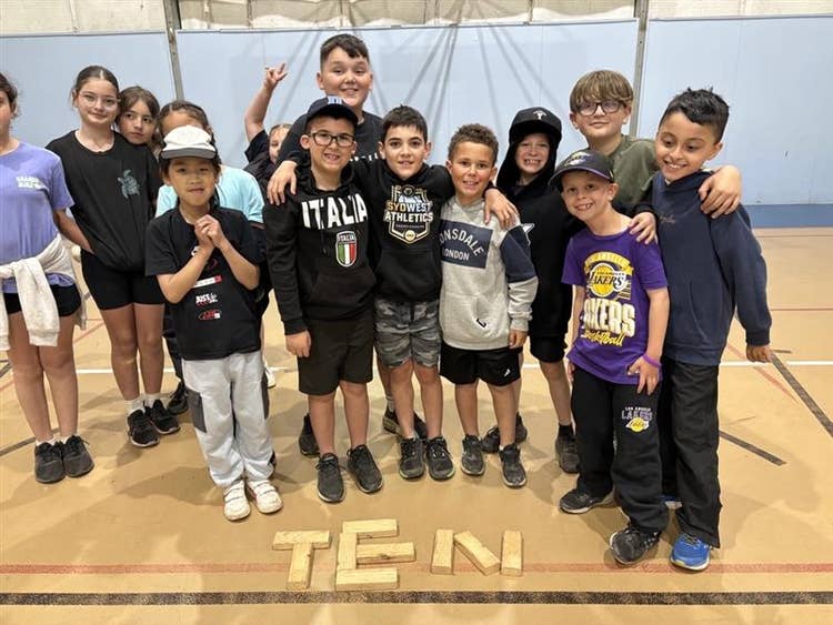 GRoup of students participating in an activity.